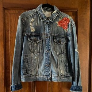 NWOT American Eagle Outfitters distressed/embroidered denim jacket size small.